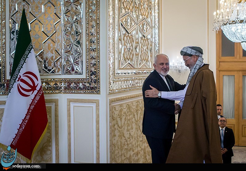(تصاویر) دیدار رئیس شورای عالی صلح افغانستان با ظریف